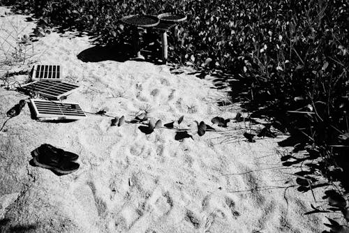 Foto profissional grátis de areia, bares, calçados