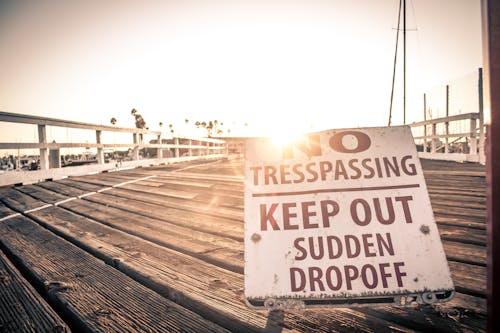 Sign Forbidding Entry on a Pier 