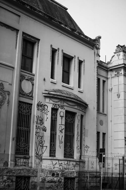 A Grayscale Photo of an Abandoned Building