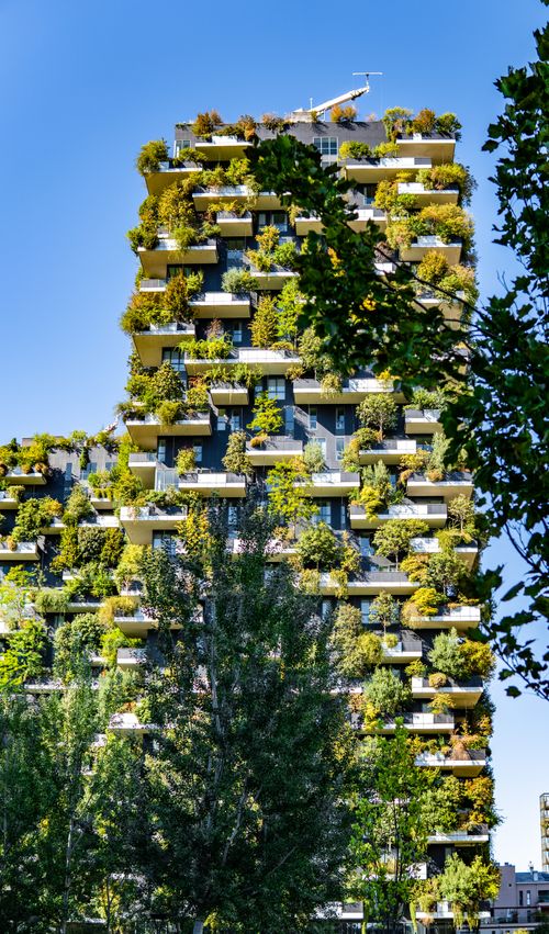 Free Modern sustainable building with greenery in Milan, showcasing vertical forest architecture. Stock Photo