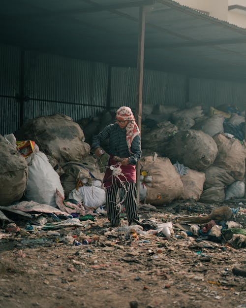 Person Sorting through Trash