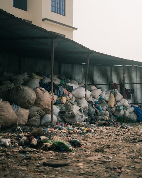 Bags Stacked under Building