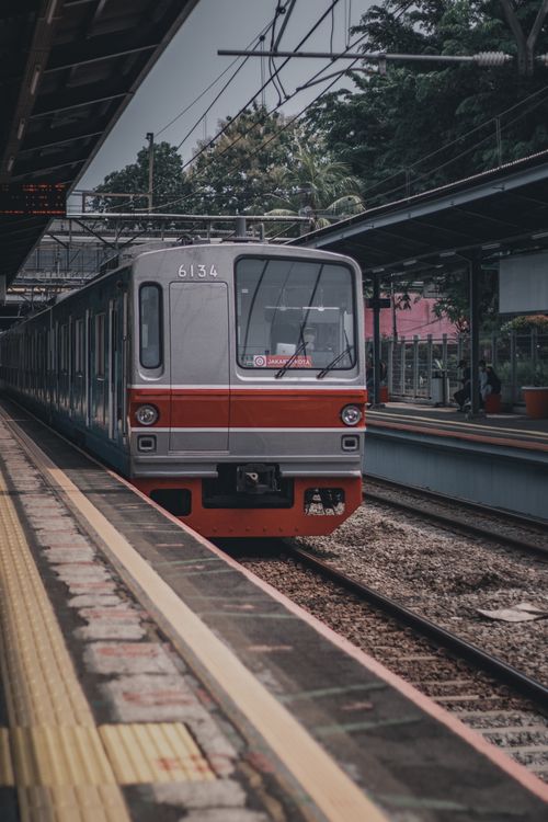 Free Close-up of a metro train at a busy urban station platform, showcasing public transportation infrastructure. Stock Photo