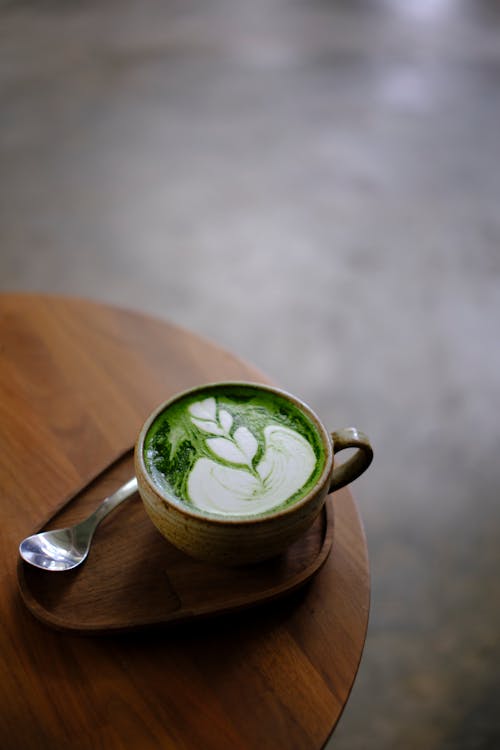 A Matcha Latte on a Ceramic Cup