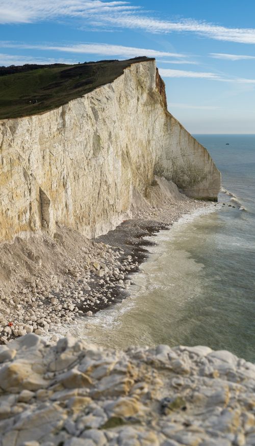 Free A breathtaking view of the iconic white cliffs of Seaford in England, overlooking the English Channel. Stock Photo