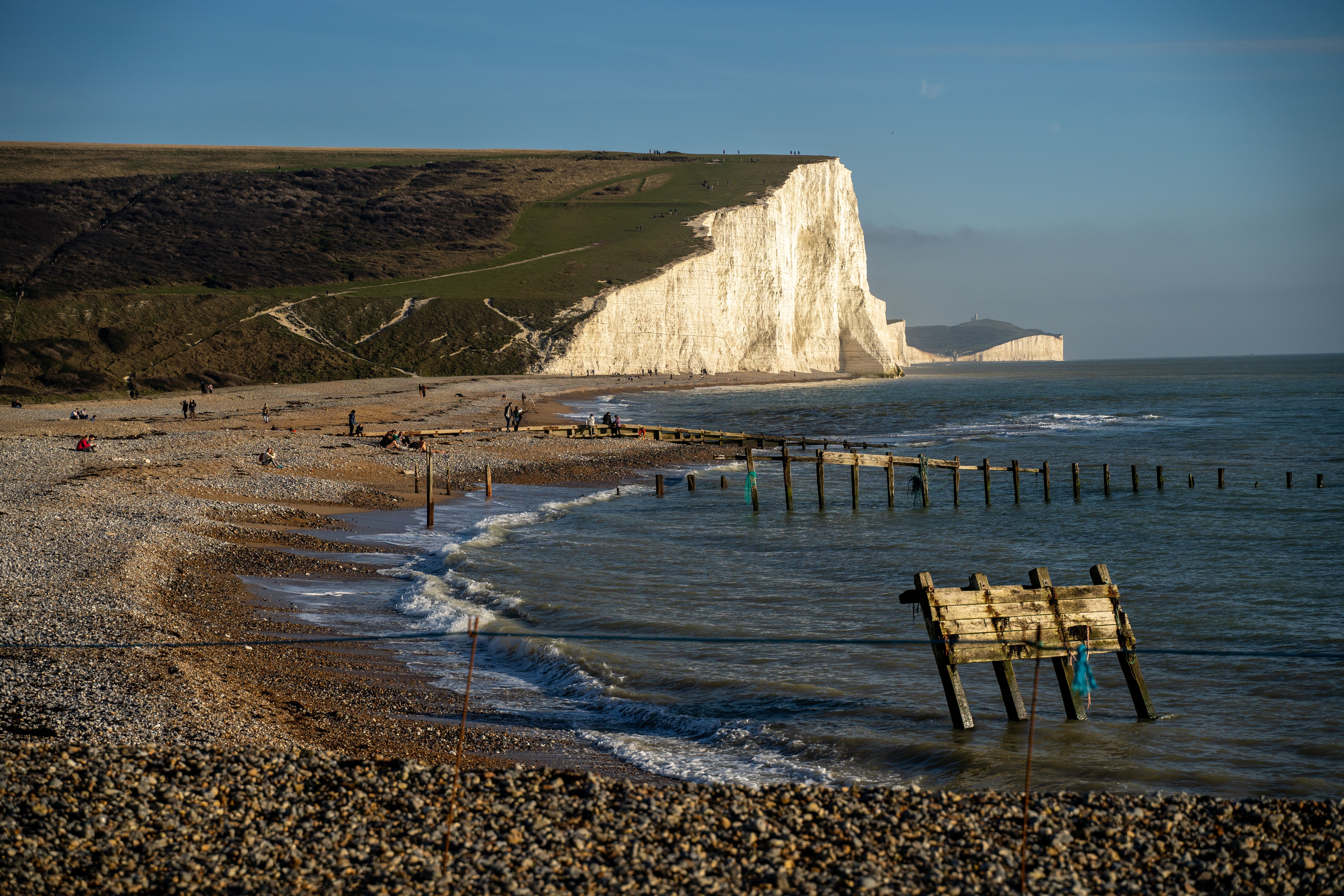 Stunning view of the Seven Sisters cliffs in Seaford, England at daytime.