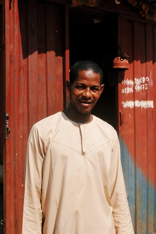 Smiling Man in White  Long Sleeves 