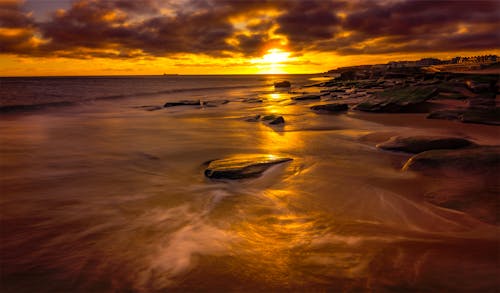 Безкоштовне стокове фото на тему «берег, Захід сонця, золота година»