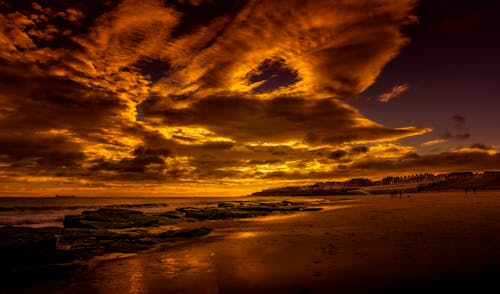 Ücretsiz akşam karanlığı, altın saat, deniz kıyısı içeren Ücretsiz stok fotoğraf Stok Fotoğraflar