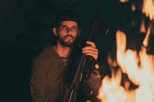 Man Sitting with Automatic Gun