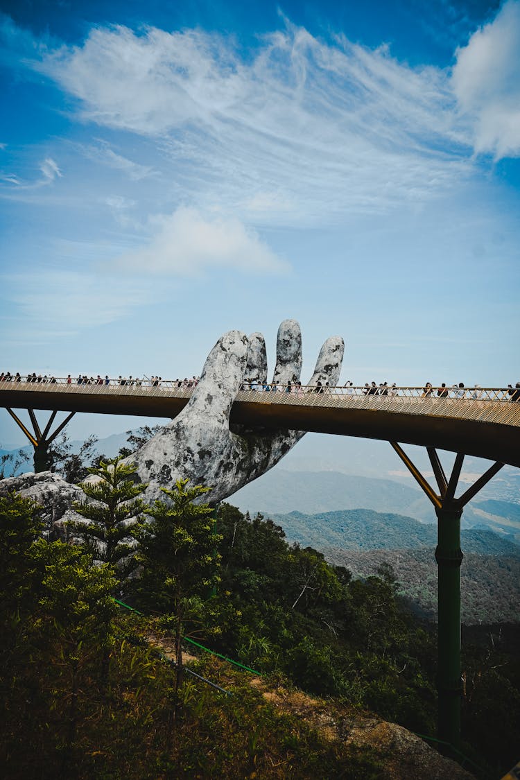 People At The Golden Bridge In Vietnam