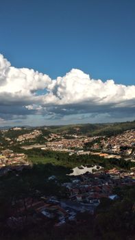 A tranquil aerial view of Jardim Corcovado in São Paulo, showcasing urban landscape under bright skies.
