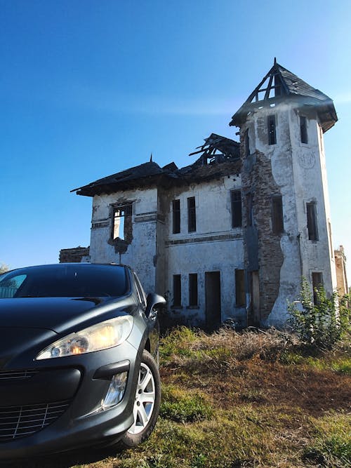 Безкоштовне стокове фото на тему «автомобіль, Будинки, вертикальні постріл»