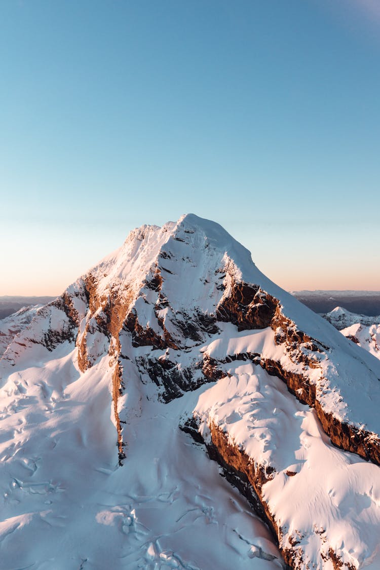 Clear Sky Over Mountain Peak