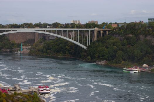 Explore the stunning Rainbow Bridge over Niagara Falls, connecting USA and Canada.