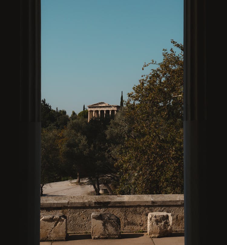 Clear Sky And Trees Over Ancient Building