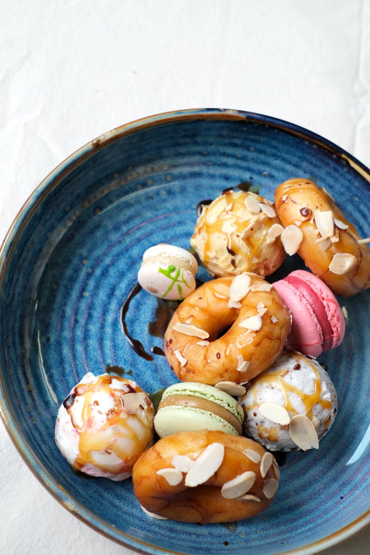 Donuts On A Blue Ceramic Plate