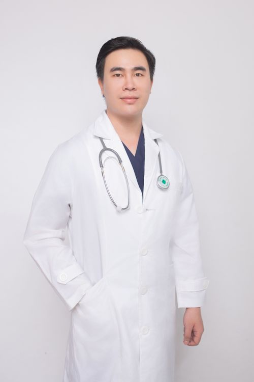Free Professional doctor in a white coat with a stethoscope in a studio setting. Stock Photo