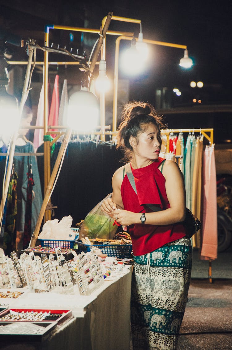 Woman On Street Market At Night