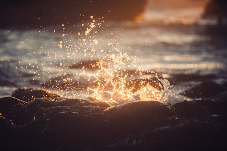 Droplets Of Water Above Rocks On Shore