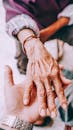Elderly Couple Holding Hands