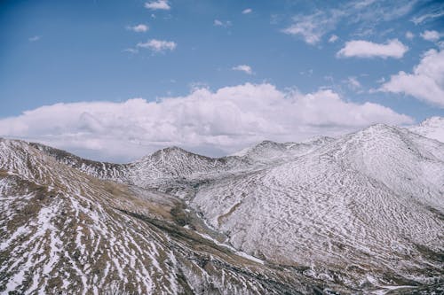 Gratis stockfoto met bergen, bergtop, blauwe lucht