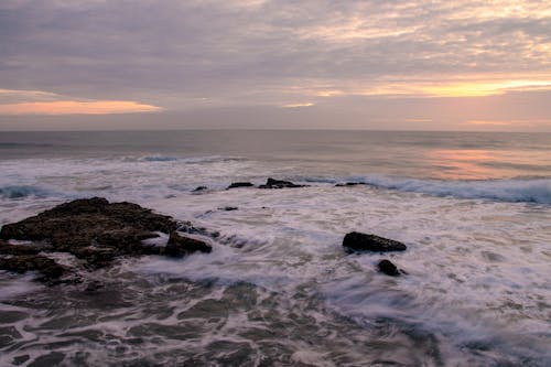 Waves Crashing on Rocks