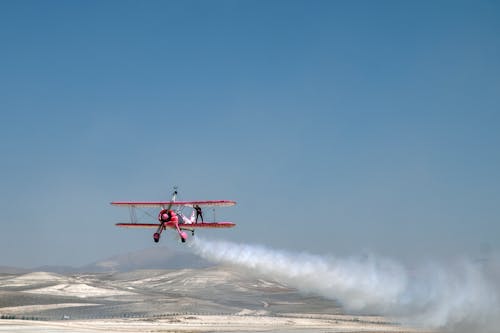 Foto stok gratis asap, biplane, gurun pasir