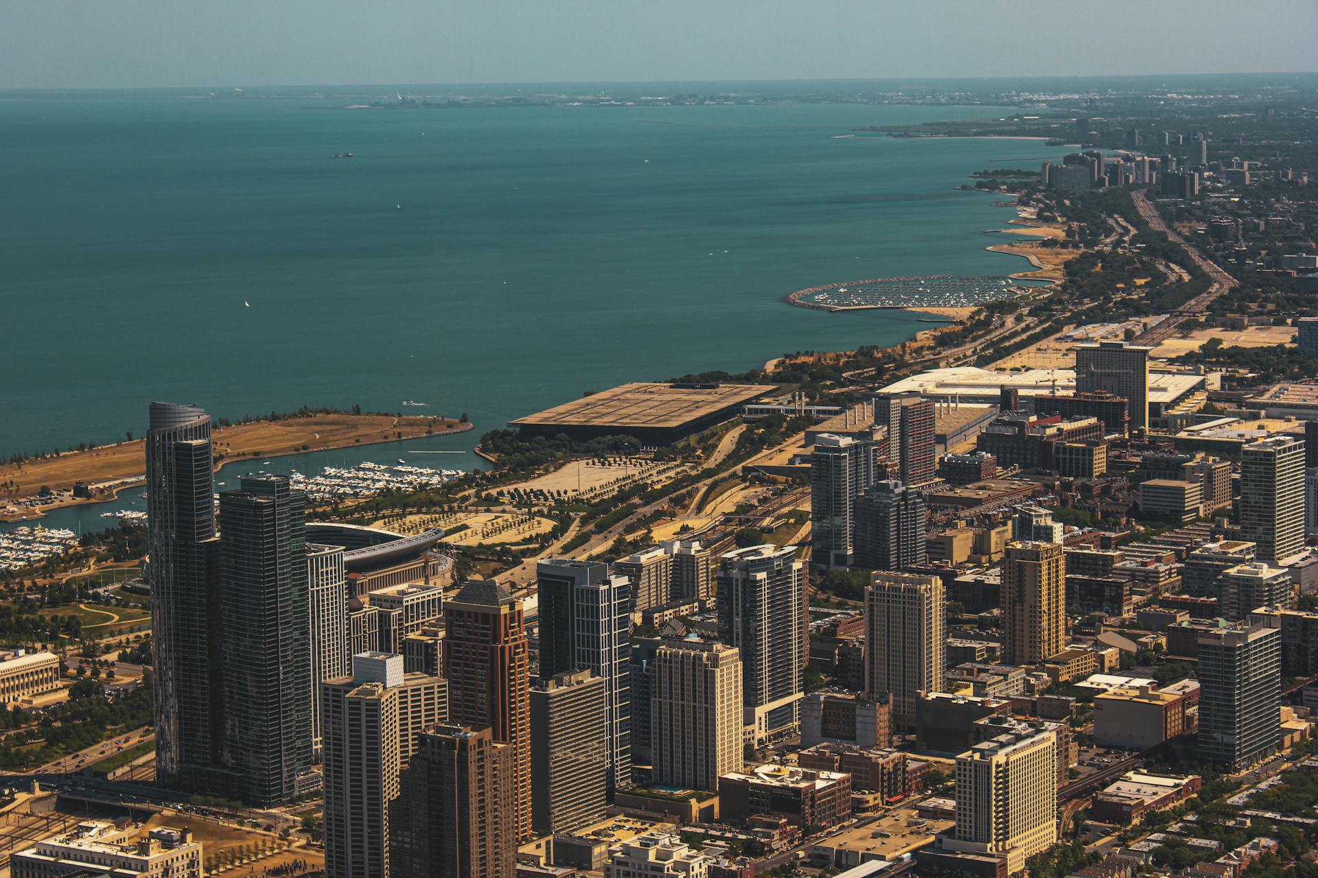 Stunning aerial view of downtown Chicago with Lake Michigan in the background.