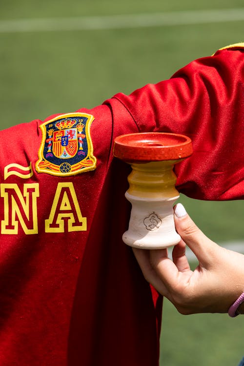 Hookah Bowl next to a Spain National Soccer Team Shirt