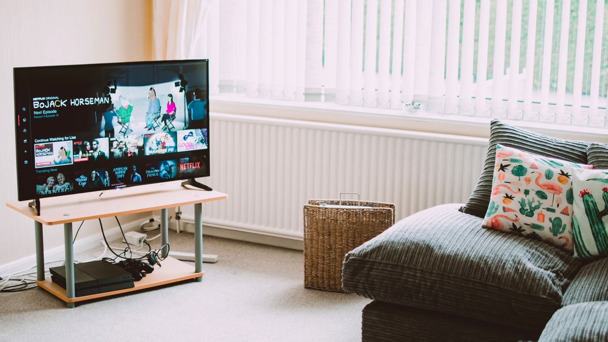 Television in a comfortable living room for British IPTV service guide
