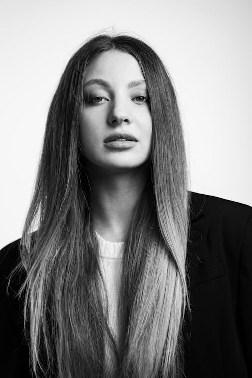 Grayscale Photo of Woman With Long Hair 