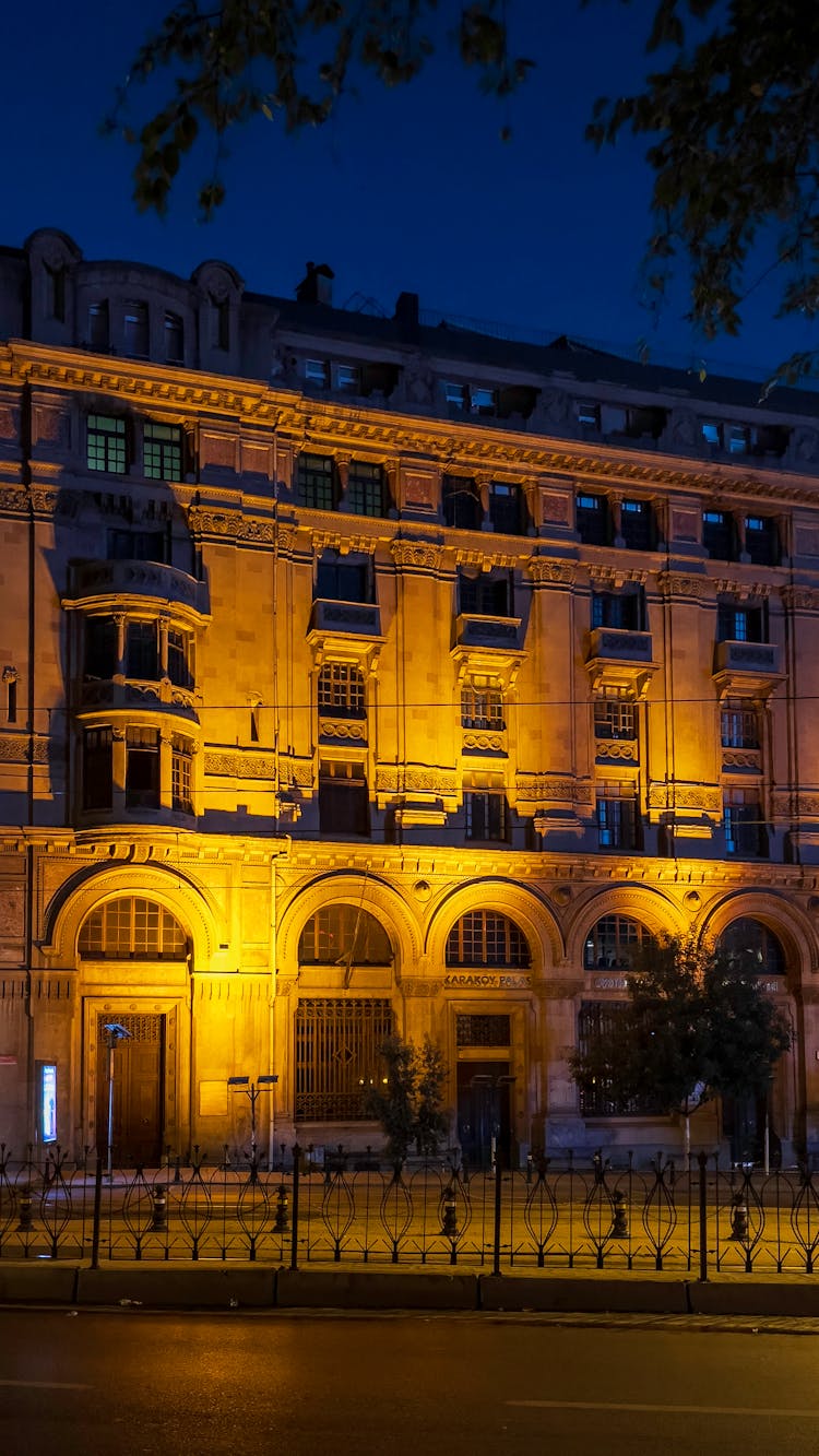 Brown Concrete Building During Night Time