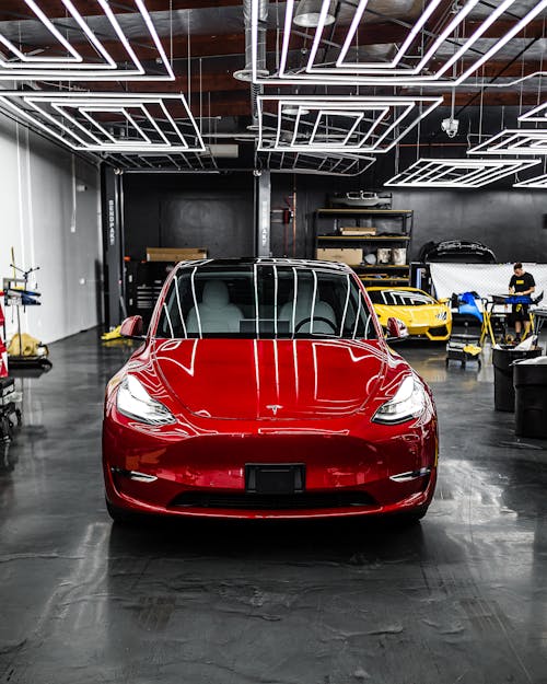 Red Car Parked in Garage