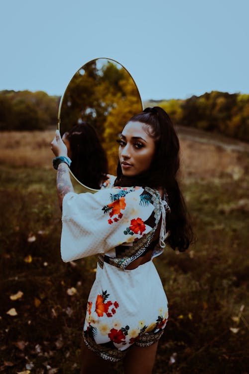 Fashion Model Girl Holding Mirror