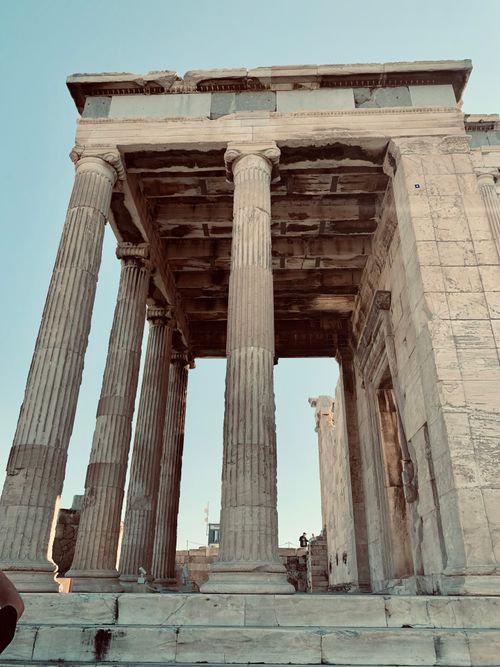 Free Stunning low angle view of the Erechtheion columns at the Acropolis, Athens, Greece. Stock Photo