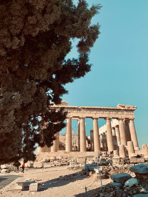 Free View of the Parthenon, an iconic ancient landmark in Athens, Greece, with clear skies. Stock Photo