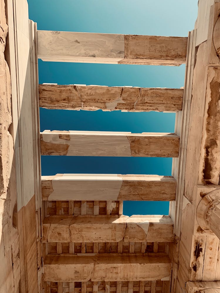 Wooden Planks On Ceiling With Clear Sky Behind