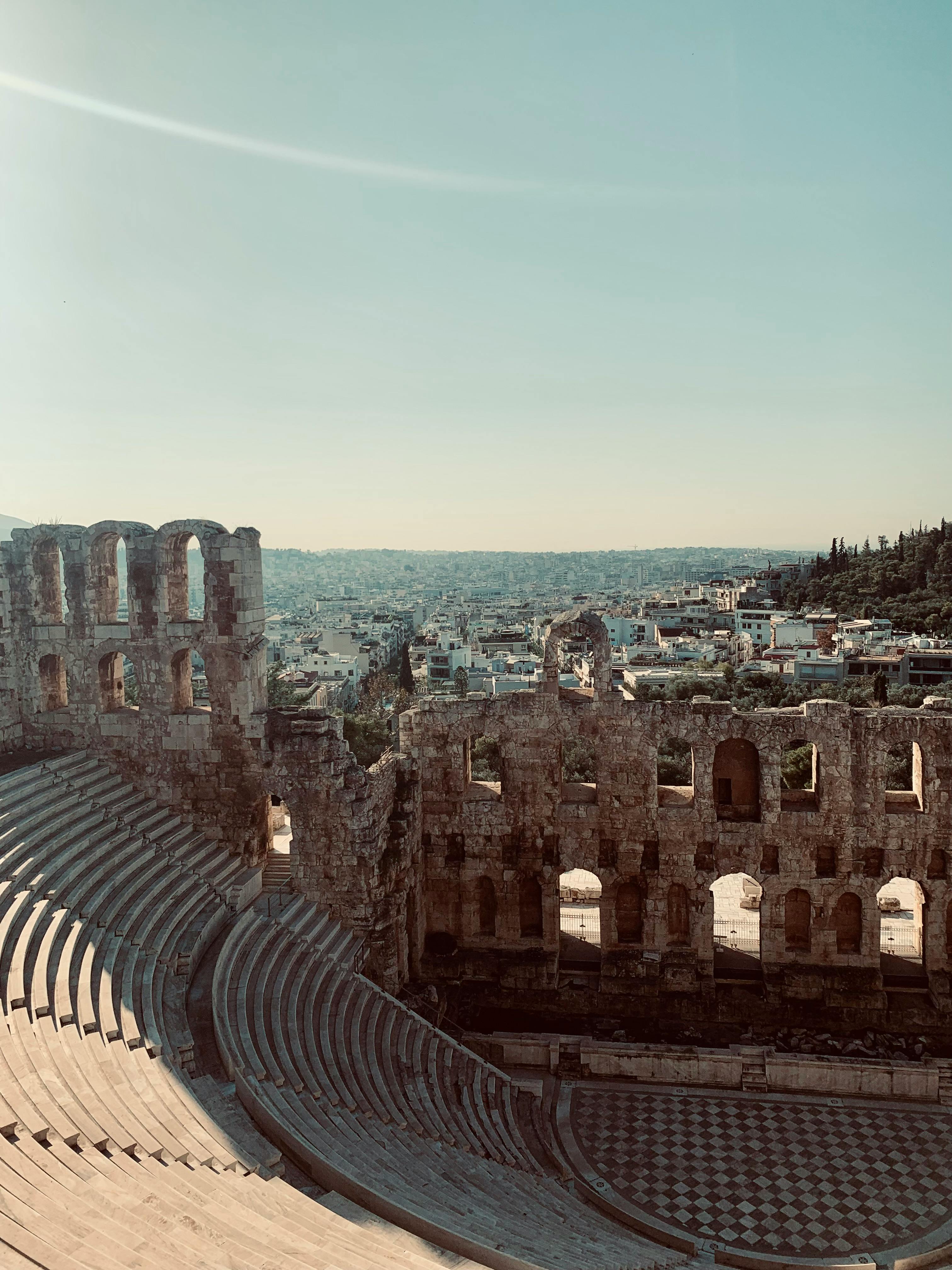 Free Explore the iconic ruins of the Odeon of Herodes Atticus in Athens under a clear sky. Stock Photo