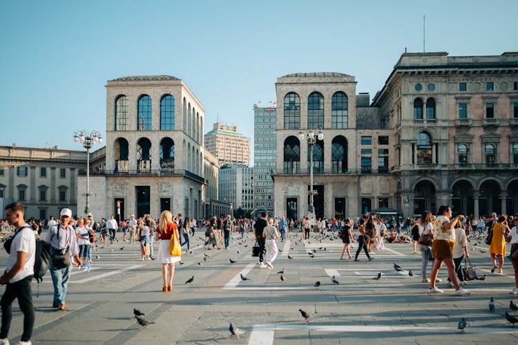 Tourists Walking On Museo Del Novecento Plaza