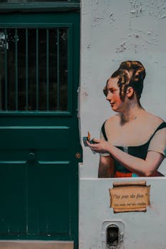 Captivating vintage-style mural of a woman on a Paris street, capturing a retro urban vibe.