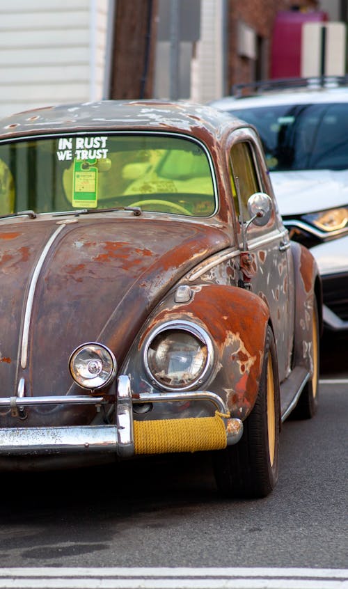 A Parked Rust Volkswagen Beetle