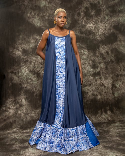 Woman Posing in a Long Blue Dress