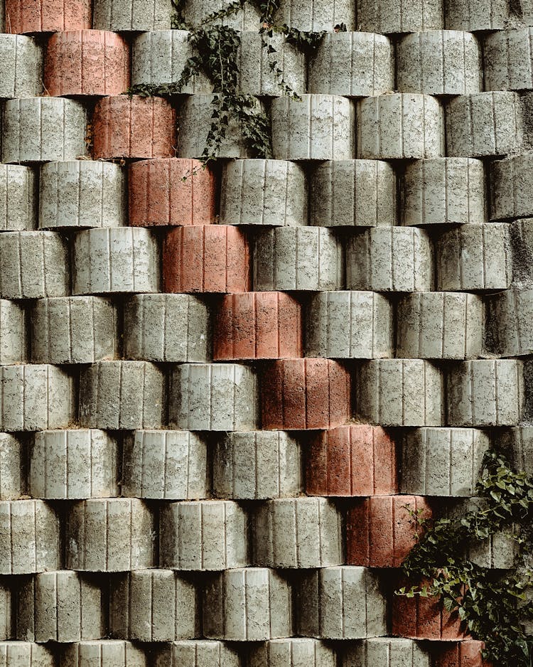 Red And Gray Stone Blocks On Wall