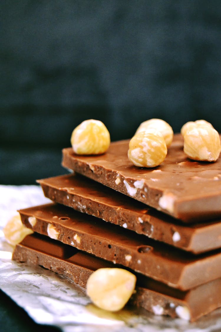 Photograph Of Hazelnuts On Top Of Chocolate