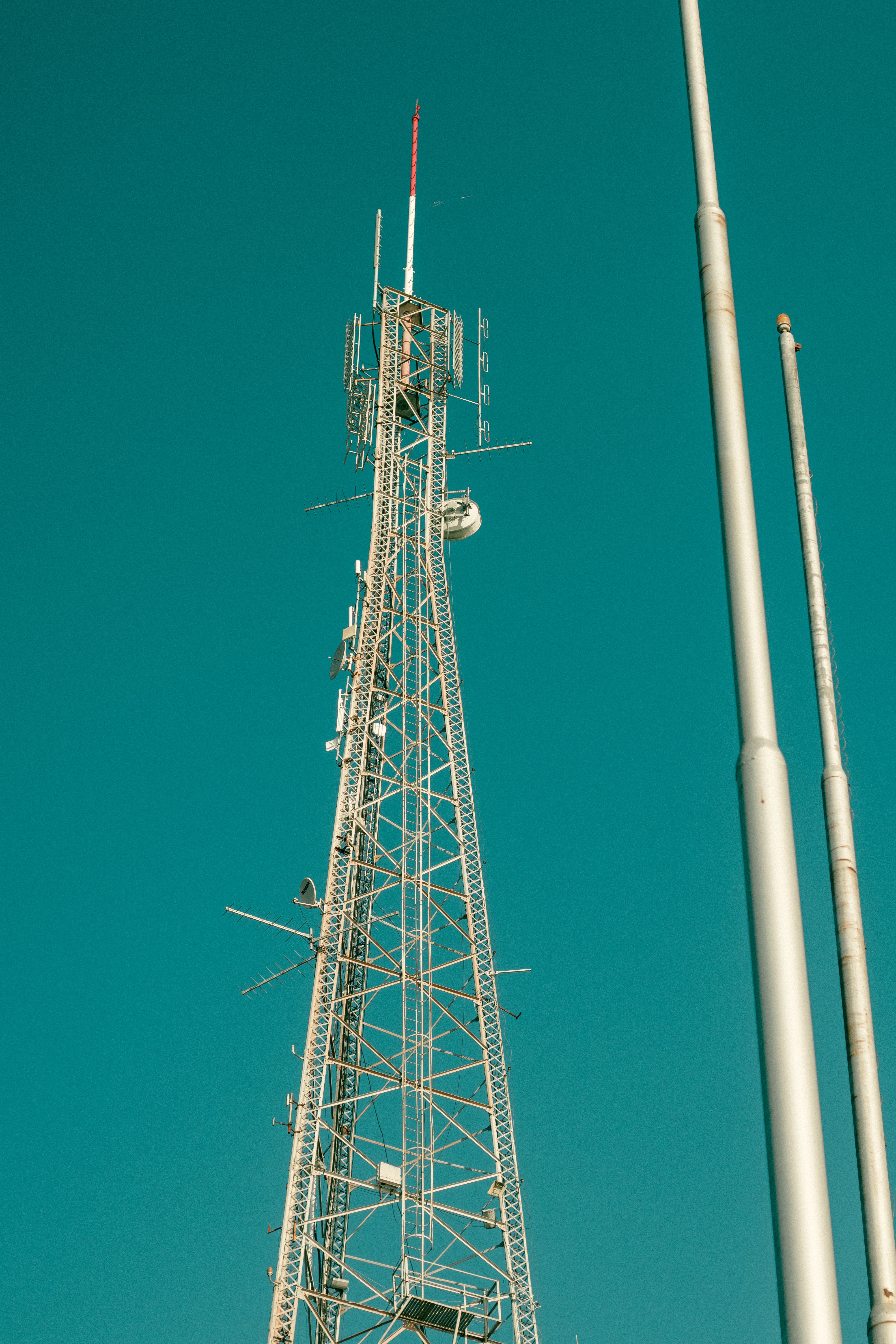 Low Angle Shot of a Transmission Tower · Free Stock Photo