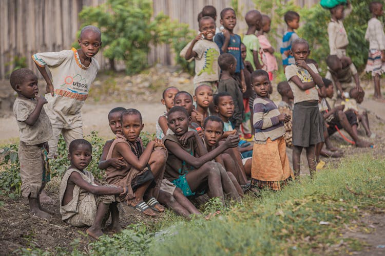 Group Of Children Sitting On The Ground