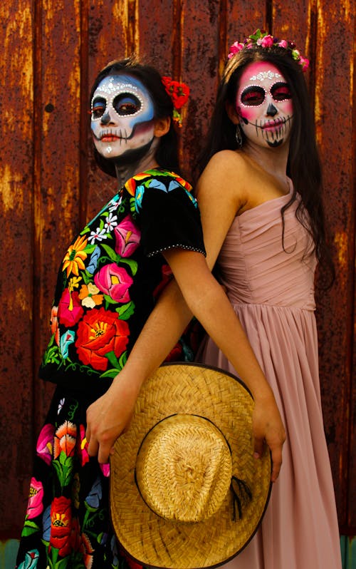 Woman in Dia De Los Muertos Costumes