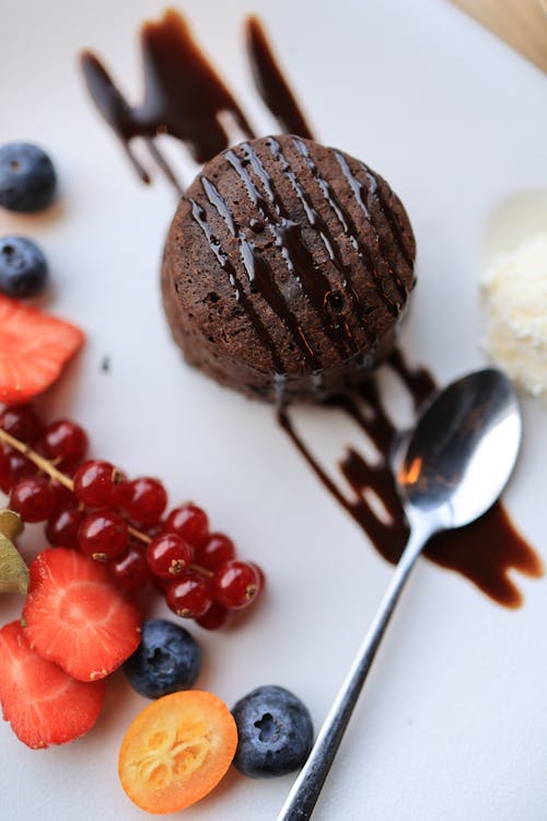 Fruit Slices Beside the Chocolate Brownie