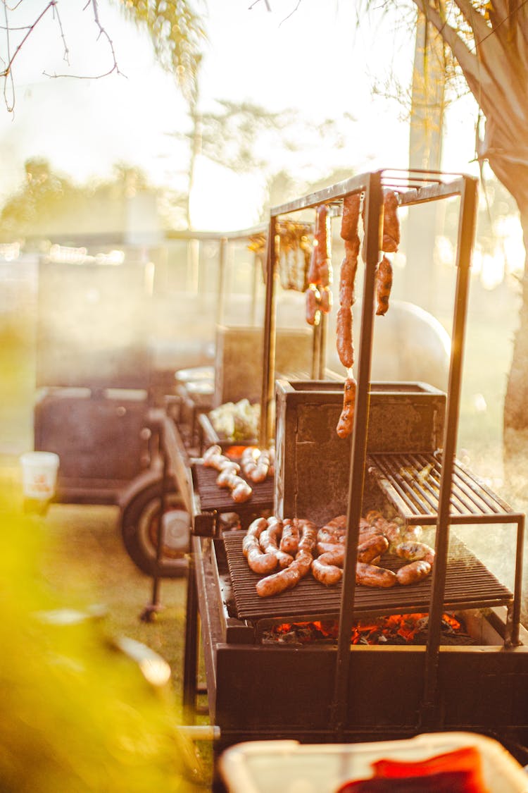 Cooking Sausages On Charcoal Grill